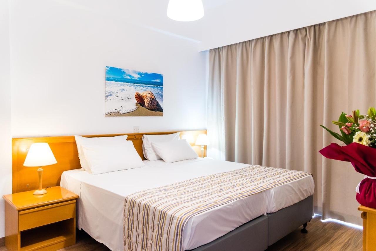 Helios Bay Hotel And Suites Klorakas Exteriör bild
